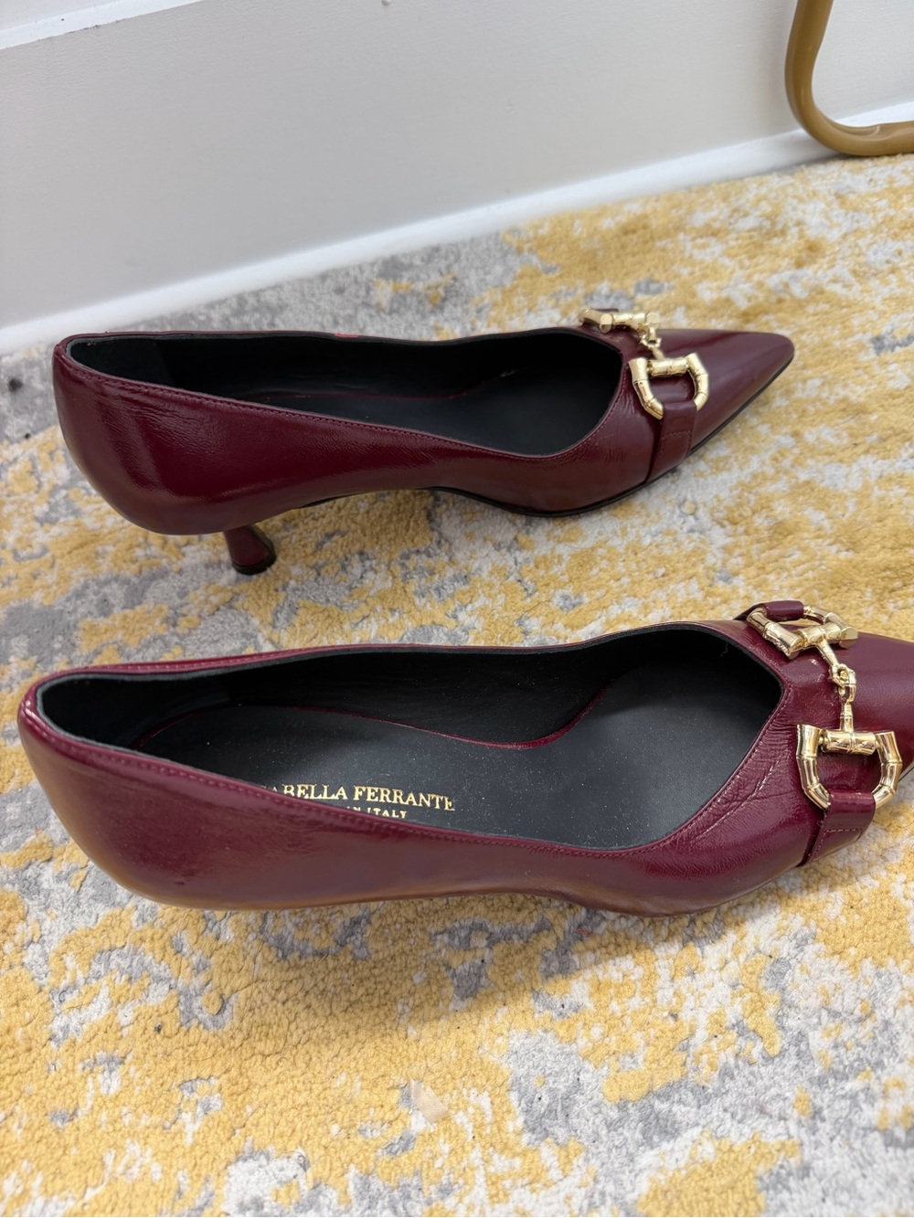 Burgundy Pointed-Toe Kitten Heel Pumps with Gold Hardware